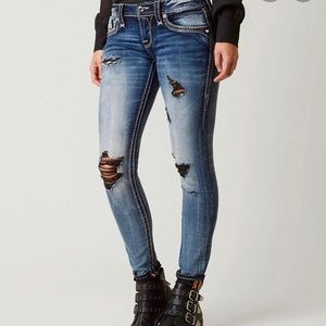 Rock revival! Skinny! With black distressing.